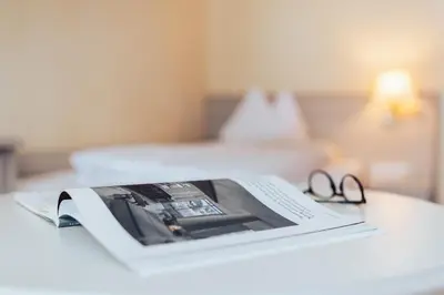Ein Bett oder Betten in einem Zimmer der Unterkunft Hotel Römerhof Superior