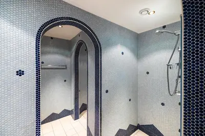 Ein Badezimmer in der Unterkunft Hotel Breitlehenalm