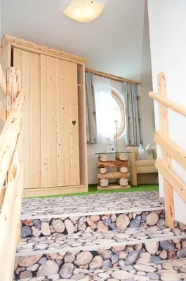 Ein Bett oder Betten in einem Zimmer der Unterkunft Hartweger's Hotel
