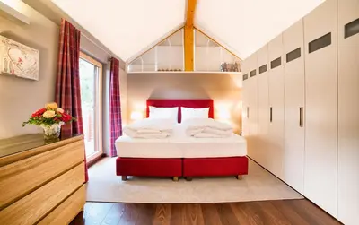 Ein Bett oder Betten in einem Zimmer der Unterkunft Das Penthaus Katschberg