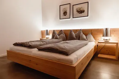 Ein Bett oder Betten in einem Zimmer der Unterkunft ALPINE LOFT Martini