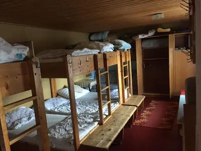 Ein Etagenbett oder Etagenbetten in einem Zimmer der Unterkunft Zettlerhütte Planneralm