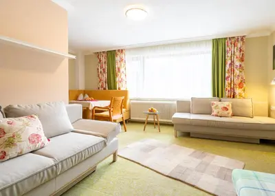 Ein Sitzbereich in der Unterkunft Chalet Ferienhaus Hubertus