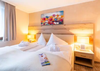 Ein Bett oder Betten in einem Zimmer der Unterkunft Chalet Ferienhaus Hubertus