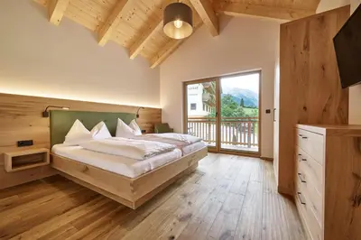 Ein Bett oder Betten in einem Zimmer der Unterkunft Ferienwohnungen Schwabhof