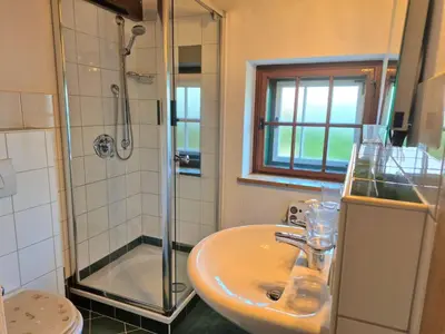 Ein Badezimmer in der Unterkunft Ferienlounge Bluntausee