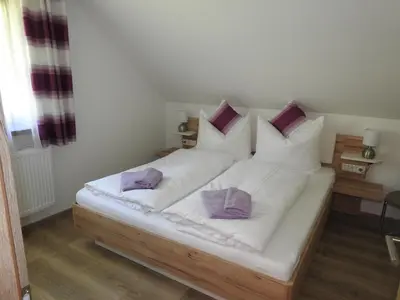 Ein Bett oder Betten in einem Zimmer der Unterkunft Ferienhaus Kristabauer