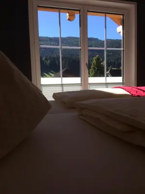 Ein Bett oder Betten in einem Zimmer der Unterkunft Ferienhaus Wind