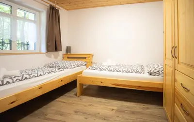 Ein Bett oder Betten in einem Zimmer der Unterkunft Apartmenthaus Esther