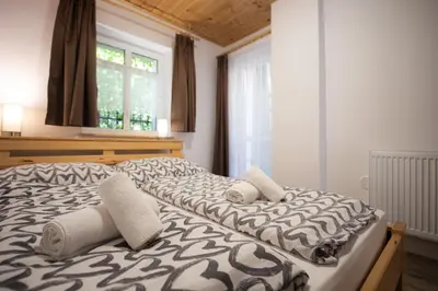 Ein Bett oder Betten in einem Zimmer der Unterkunft Apartmenthaus Esther