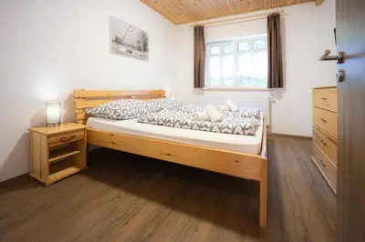 Ein Bett oder Betten in einem Zimmer der Unterkunft Apartmenthaus Esther