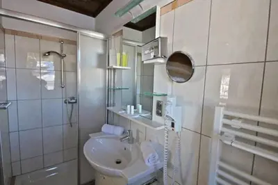 Ein Badezimmer in der Unterkunft Hotel Seewinkel