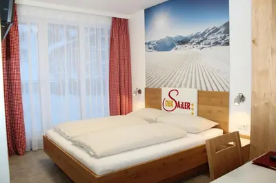 Ein Bett oder Betten in einem Zimmer der Unterkunft Der Sailer Hotel & Restaurant
