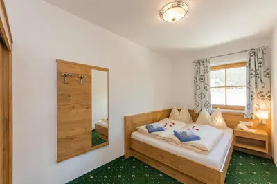 Ein Bett oder Betten in einem Zimmer der Unterkunft Apartments Unterfischergut