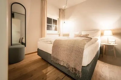 Ein Bett oder Betten in einem Zimmer der Unterkunft Exklusive Seeappartements beim Elfenhaus
