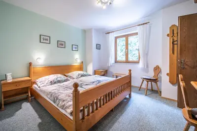 Ein Bett oder Betten in einem Zimmer der Unterkunft Haus Marianne