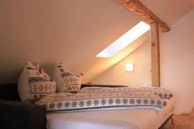 Ein Bett oder Betten in einem Zimmer der Unterkunft Apartment Pötzelberghof