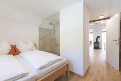 Ein Bett oder Betten in einem Zimmer der Unterkunft Apartment Pötzelberghof
