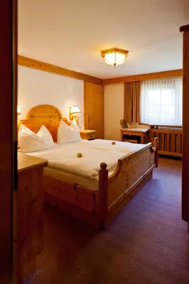 Ein Bett oder Betten in einem Zimmer der Unterkunft Bio-Bauernhof Grundlehnerhof
