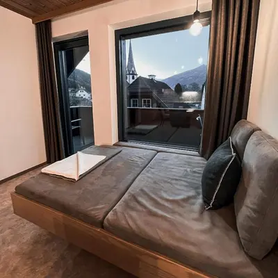 Ein Bett oder Betten in einem Zimmer der Unterkunft Hoamat House I Boutique Apartments