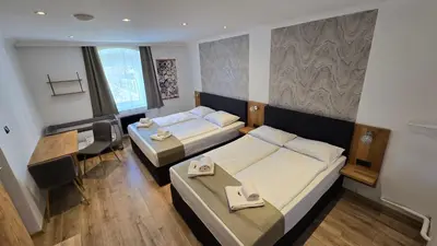 Ein Bett oder Betten in einem Zimmer der Unterkunft Gasthof Kreischberg