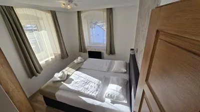 Ein Bett oder Betten in einem Zimmer der Unterkunft Gasthof Kreischberg