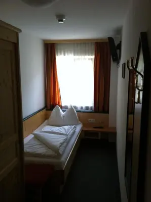 Ein Bett oder Betten in einem Zimmer der Unterkunft Werfenerhof