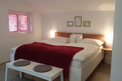 Ein Bett oder Betten in einem Zimmer der Unterkunft Gästehaus Rosa Leitgeb
