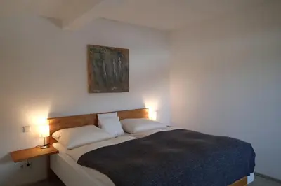 Ein Bett oder Betten in einem Zimmer der Unterkunft Gästehaus Rosa Leitgeb