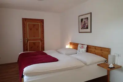 Ein Bett oder Betten in einem Zimmer der Unterkunft Gästehaus Rosa Leitgeb