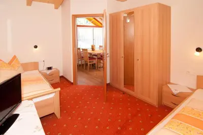 Ein Bett oder Betten in einem Zimmer der Unterkunft Haus Martina
