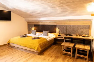 Ein Bett oder Betten in einem Zimmer der Unterkunft Pension Dachsteinhof