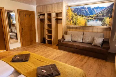 Ein Sitzbereich in der Unterkunft Pension Dachsteinhof