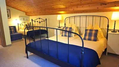 Ein Bett oder Betten in einem Zimmer der Unterkunft Pension Dachsteinhof