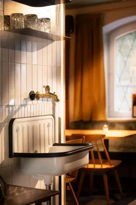 Ein Bett oder Betten in einem Zimmer der Unterkunft Schwarzes Rössl