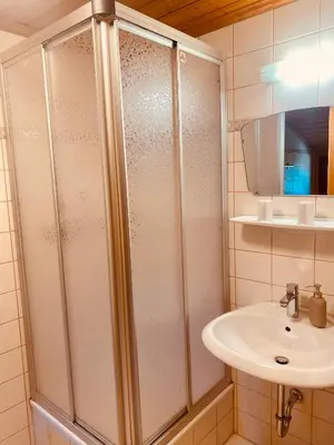 Ein Badezimmer in der Unterkunft Unerzhuberhof
