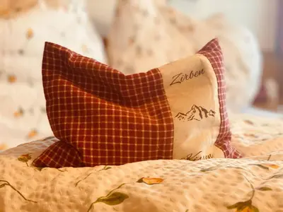 Ein Bett oder Betten in einem Zimmer der Unterkunft Unerzhuberhof