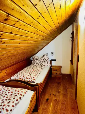 Ein Bett oder Betten in einem Zimmer der Unterkunft Unerzhuberhof