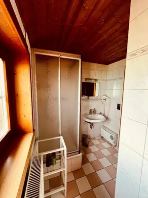 Ein Badezimmer in der Unterkunft Unerzhuberhof