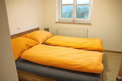 Ein Bett oder Betten in einem Zimmer der Unterkunft Ferienhaus Kühlwein