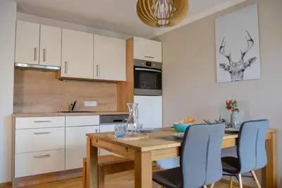 Küche/Küchenzeile in der Unterkunft Alpine Appartement Top 8 by AA Holiday Homes