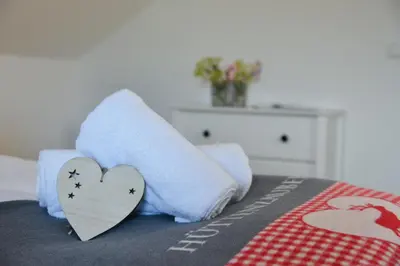 Ein Bett oder Betten in einem Zimmer der Unterkunft Alpine Appartement Top 8 by AA Holiday Homes