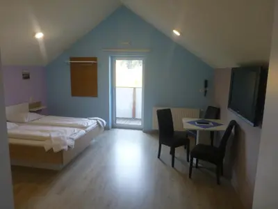 Ein Bett oder Betten in einem Zimmer der Unterkunft smartMotel