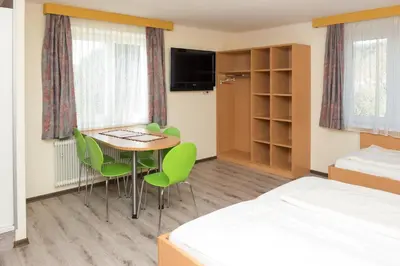 Ein Bett oder Betten in einem Zimmer der Unterkunft smartMotel