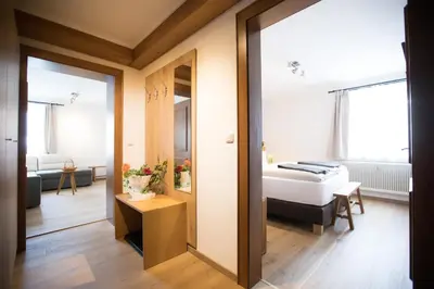 Ein Bett oder Betten in einem Zimmer der Unterkunft Hotel Moserwirt