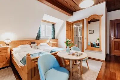 Ein Bett oder Betten in einem Zimmer der Unterkunft Landhaus Koller