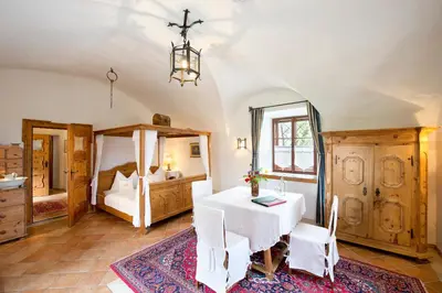 Ein Bett oder Betten in einem Zimmer der Unterkunft Aparthotel Schloss Thannegg