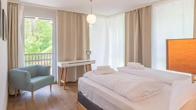Ein Bett oder Betten in einem Zimmer der Unterkunft Grimming Lodge by keyone