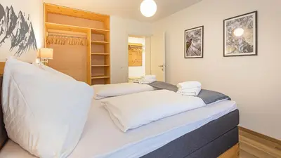 Ein Bett oder Betten in einem Zimmer der Unterkunft Grimming Lodge by keyone