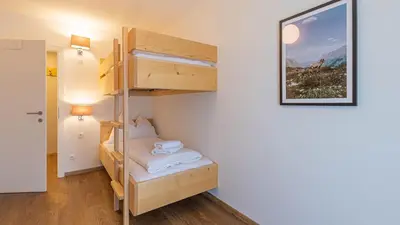 Ein Bett oder Betten in einem Zimmer der Unterkunft Grimming Lodge by keyone